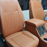 Bespoke Series Landrover Defender Seats x 2 with Marshall Cubby