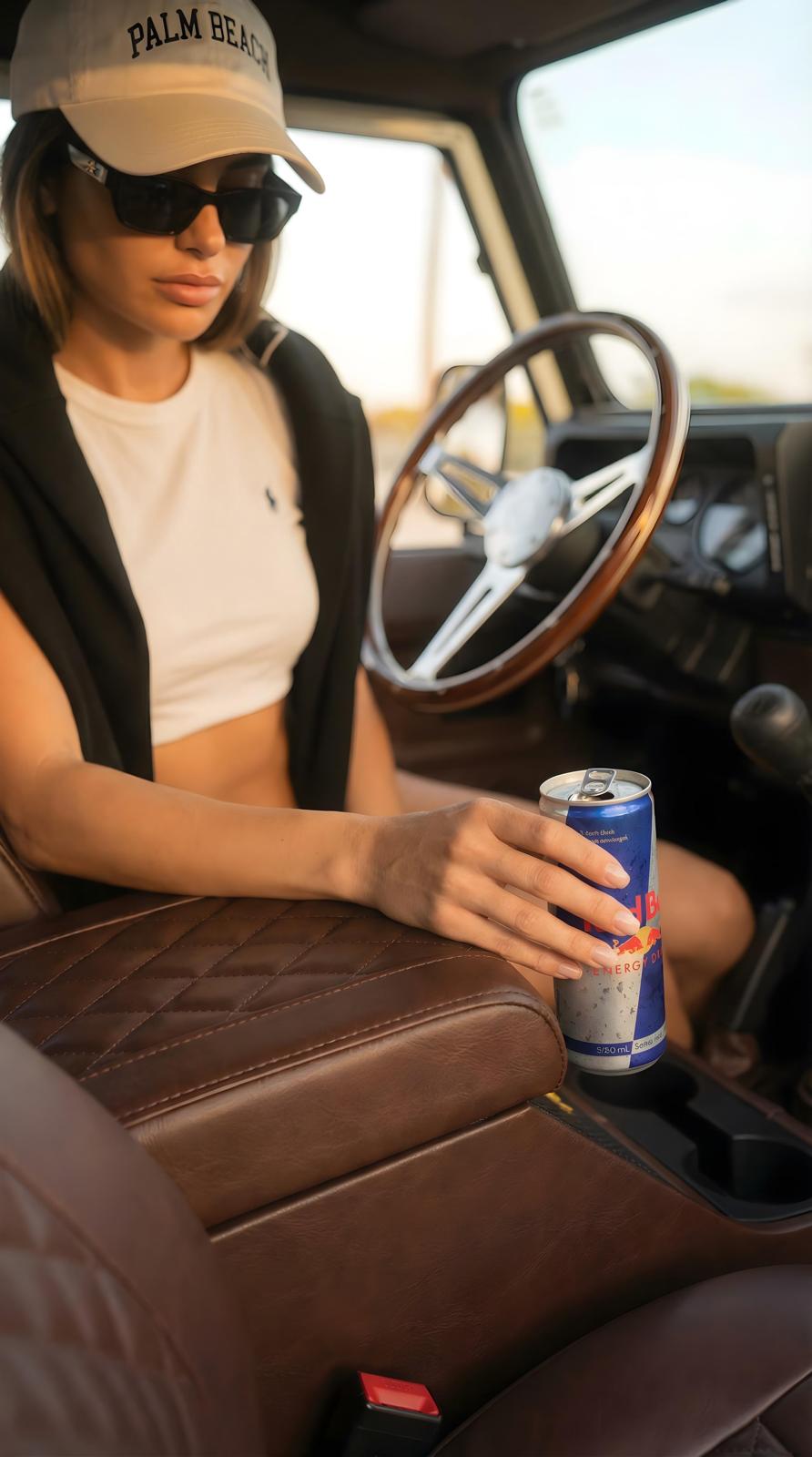 Quilted brown leather interior, Defender driver with drink