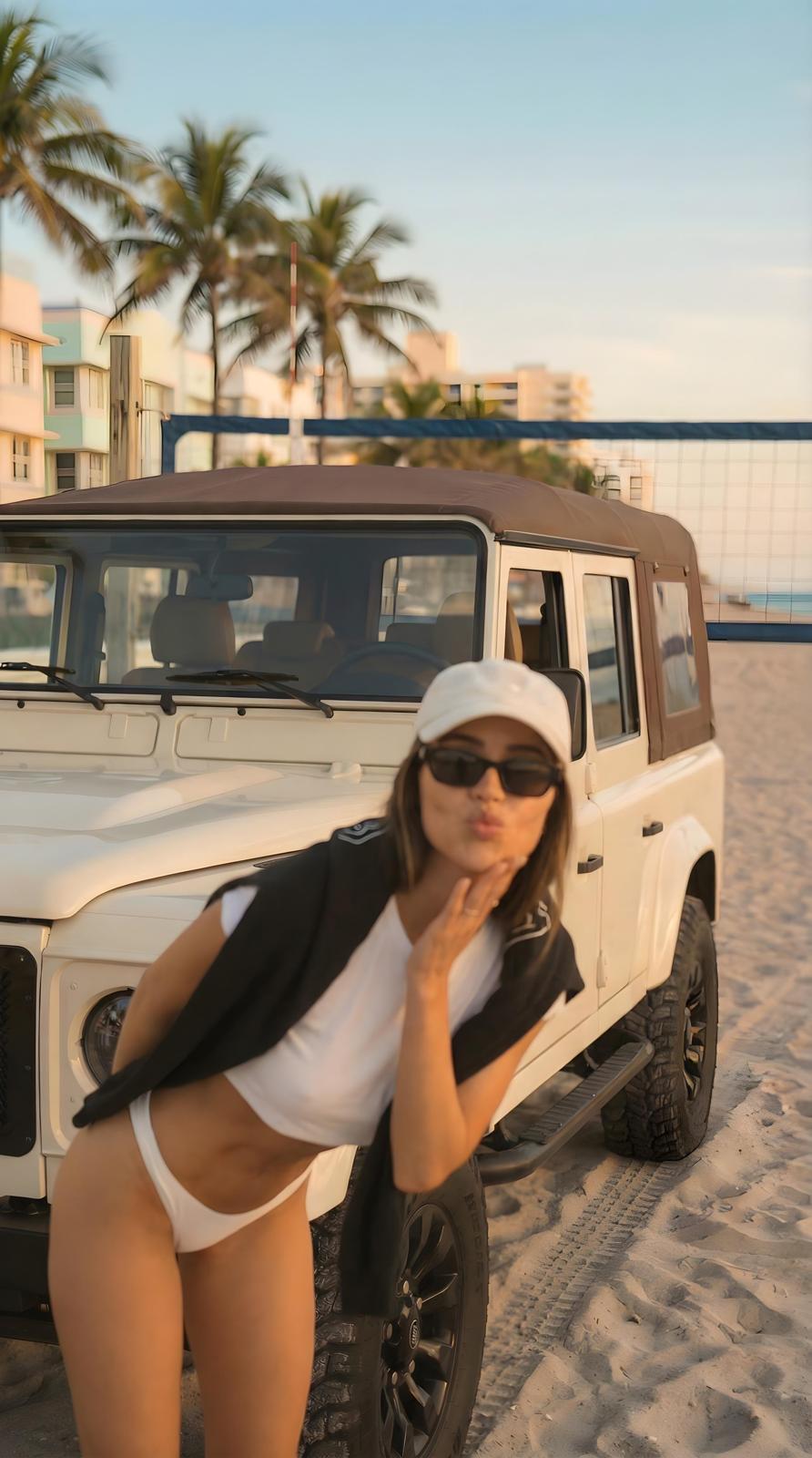 Cream Defender 110 soft top on beach